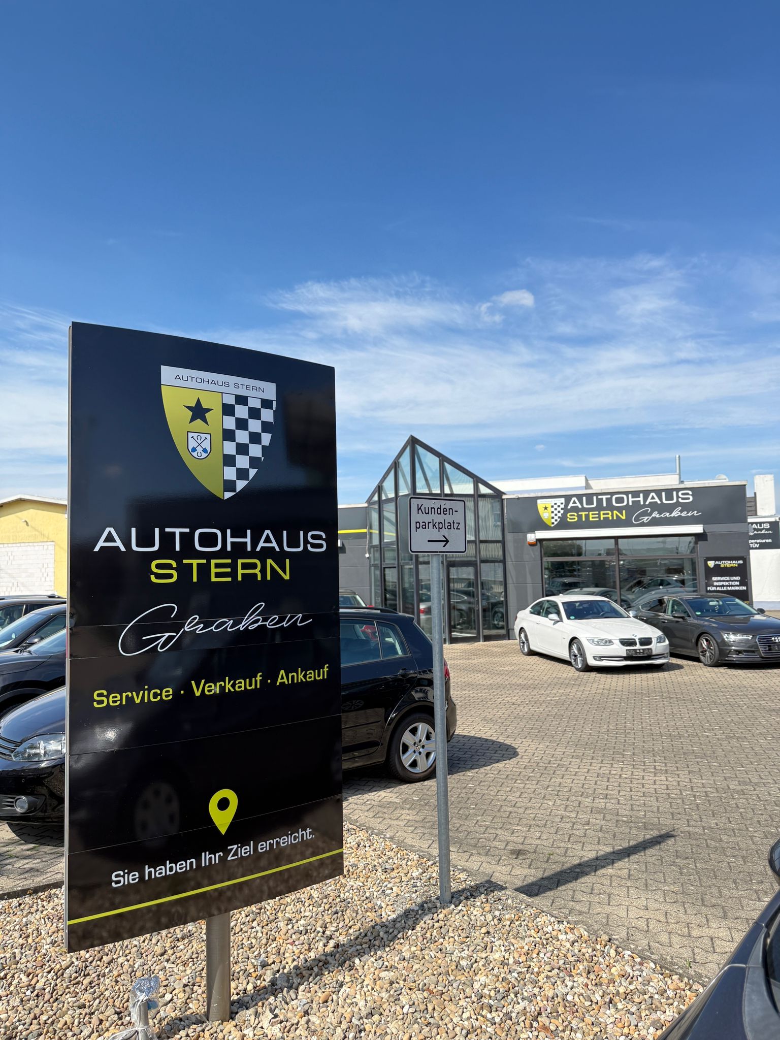 Sports coupe at sunset